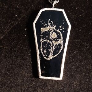 Black stained glass anotomical heart coffin pendant